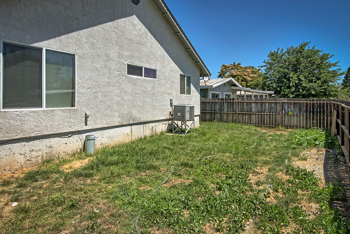 170 Gilmore Road Red Bluff, CA 96080 - Photo 32 of 33 a view of a backyard with a small cabin