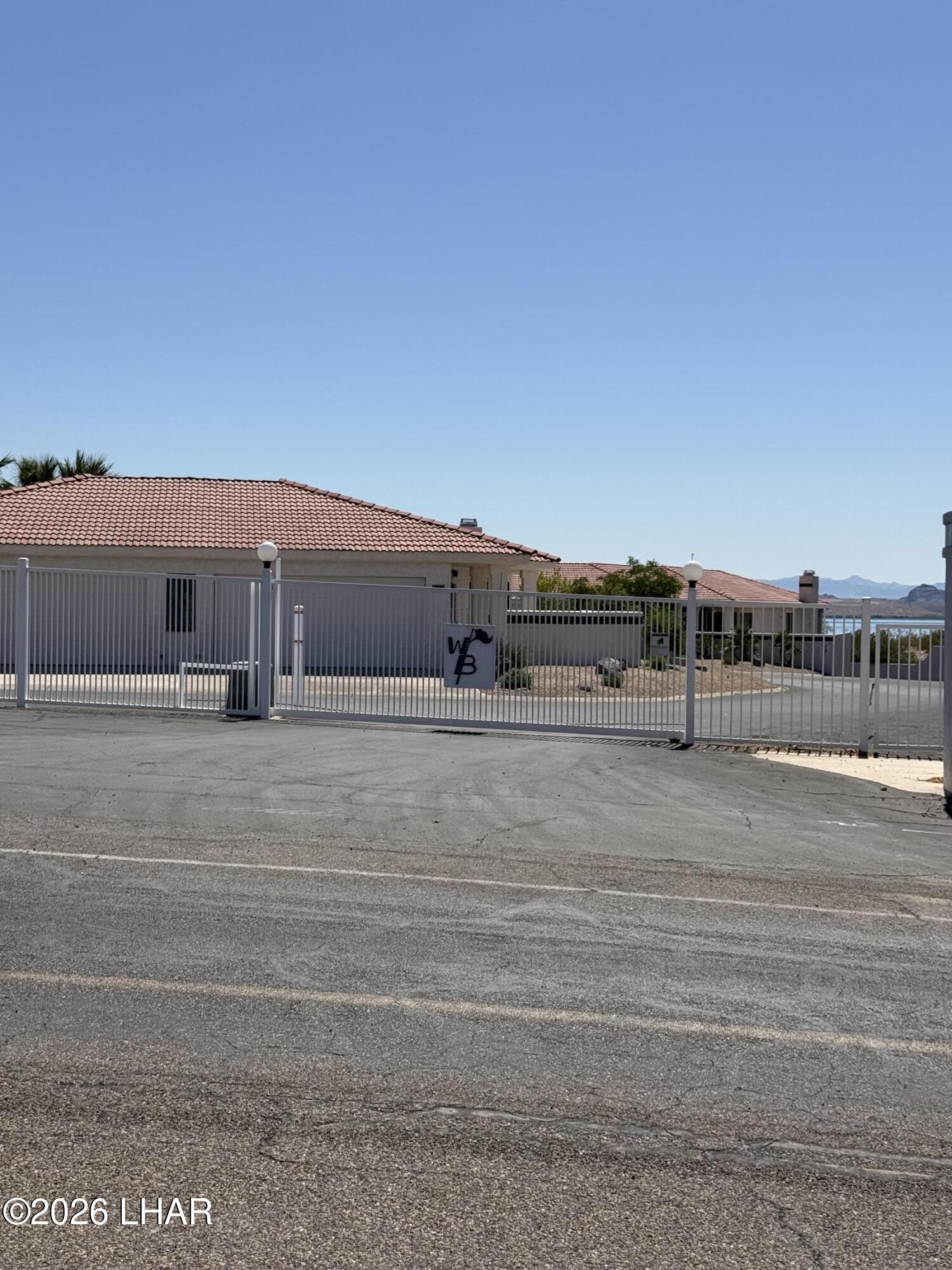 375 London Bridge Road, Unit 35 Lake Havasu City, AZ 86403 - Photo 42 of 43 SECONDARY GATE ENTRANCE WITH REMOTE ACCESS CLOSER TO UNIT