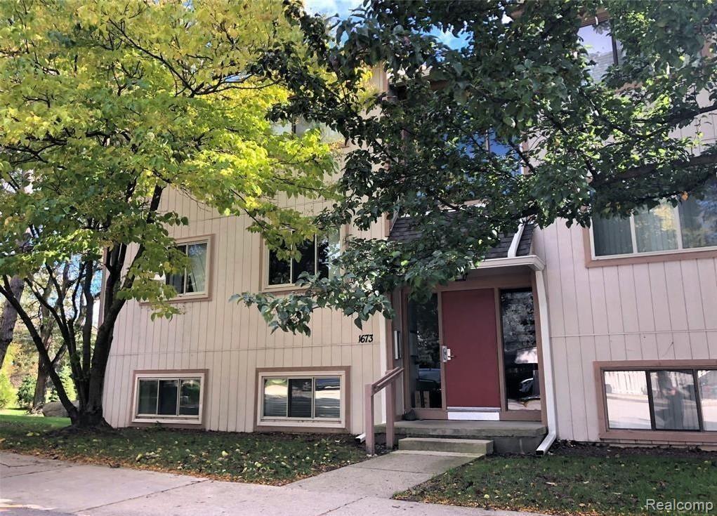 1673 Riverside Drive, Unit 4 Rochester Hills, MI 48309 - Photo 1 of 23