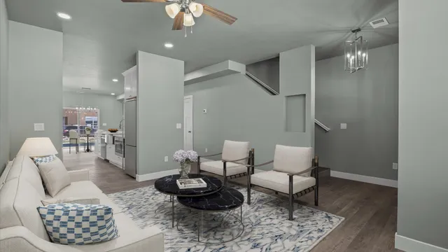 a kitchen with a sink stove and cabinets