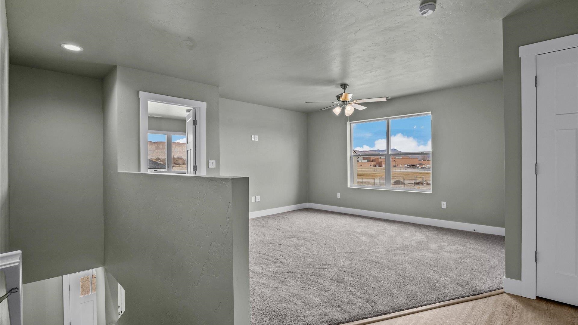 579 Fledgefield Drive Grand Junction, CO 81504 - Photo 21 of 30 a view of an empty room with a window