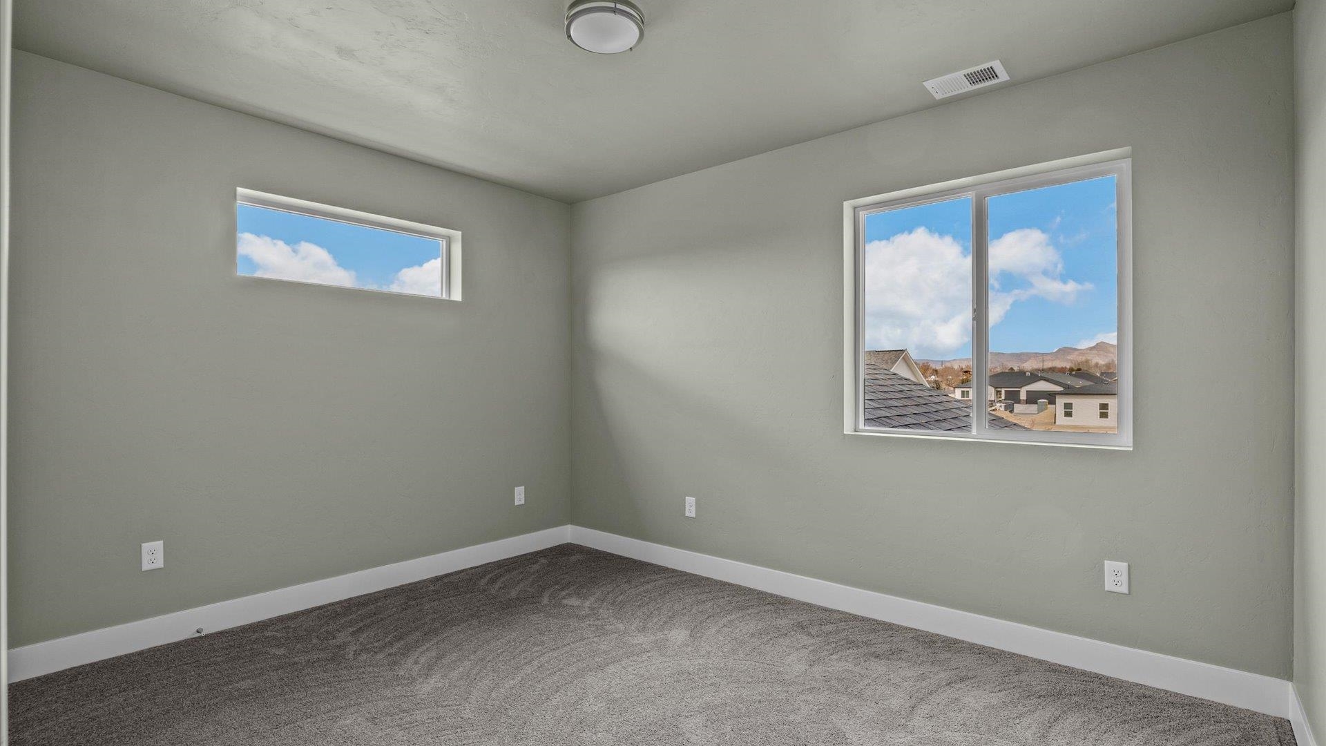 579 Fledgefield Drive Grand Junction, CO 81504 - Photo 27 of 30 an empty room with a window