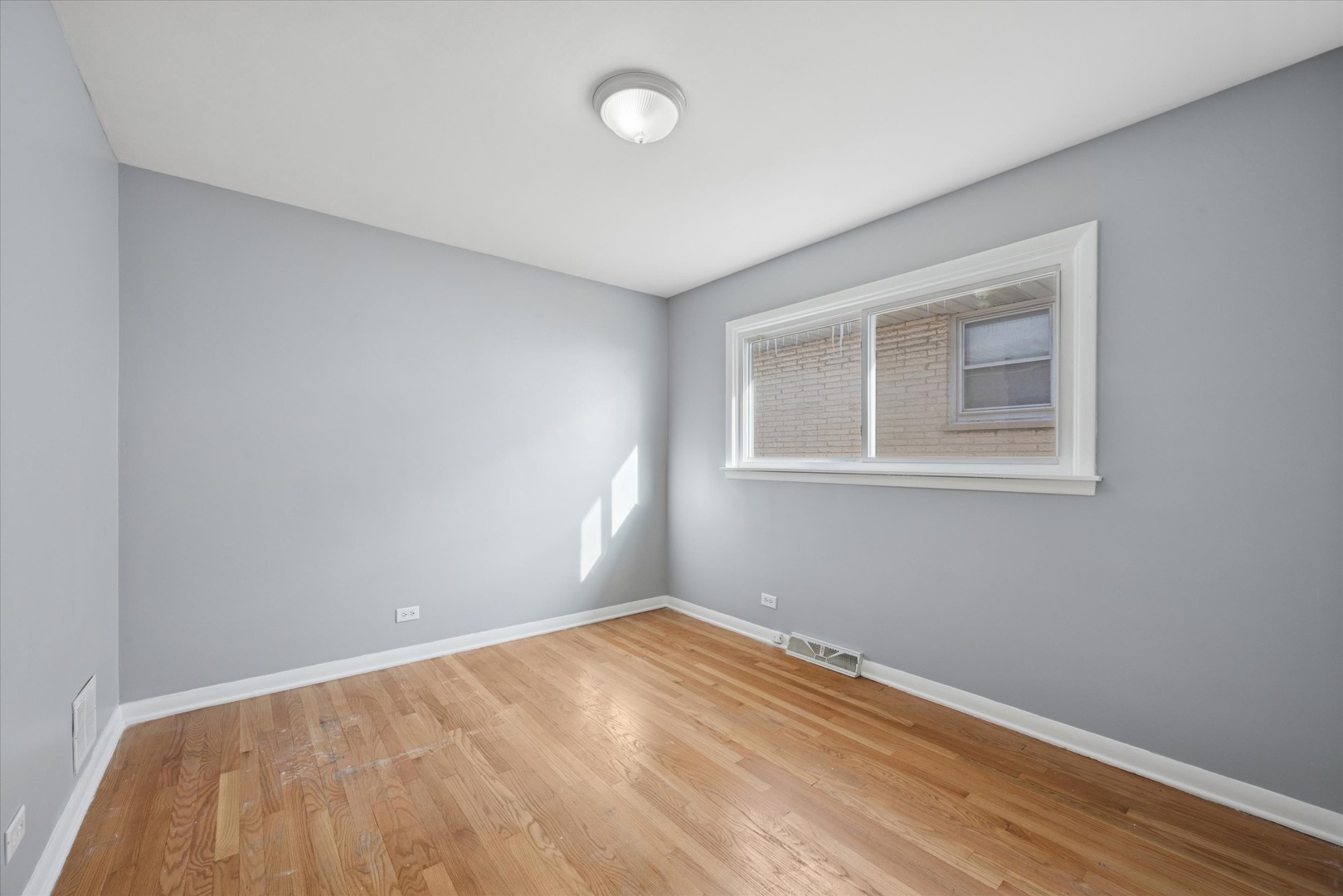 6718 41st Street Stickney, IL 60402 - Photo 7 of 15 a view of empty room with wooden floor