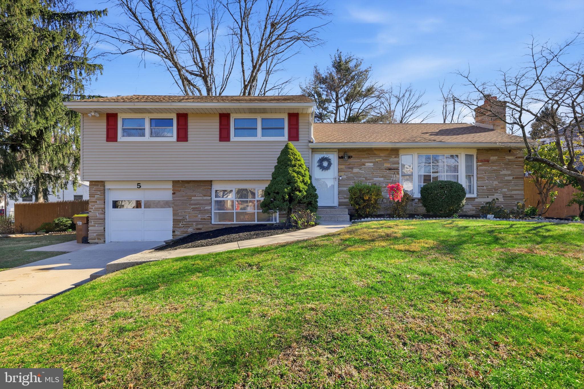 5 Patrick Lane Yardley, PA 19067 - Photo 1 of 51 front view of a house with a yard