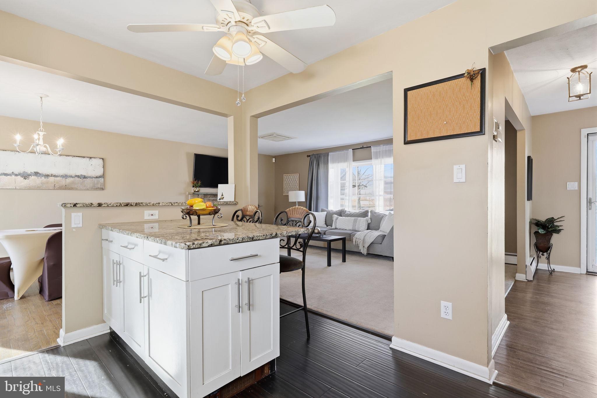 5 Patrick Lane Yardley, PA 19067 - Photo 16 of 51 a view of living room with granite countertop furniture and a fireplace