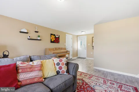 a living room with furniture and a couch