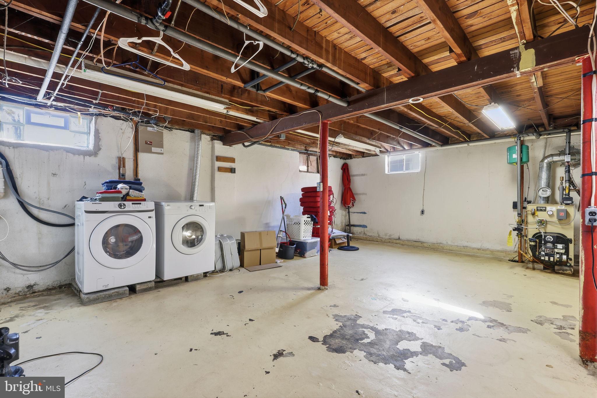 5 Patrick Lane Yardley, PA 19067 - Photo 33 of 51 a view of a storage & utility room with washer and dryer