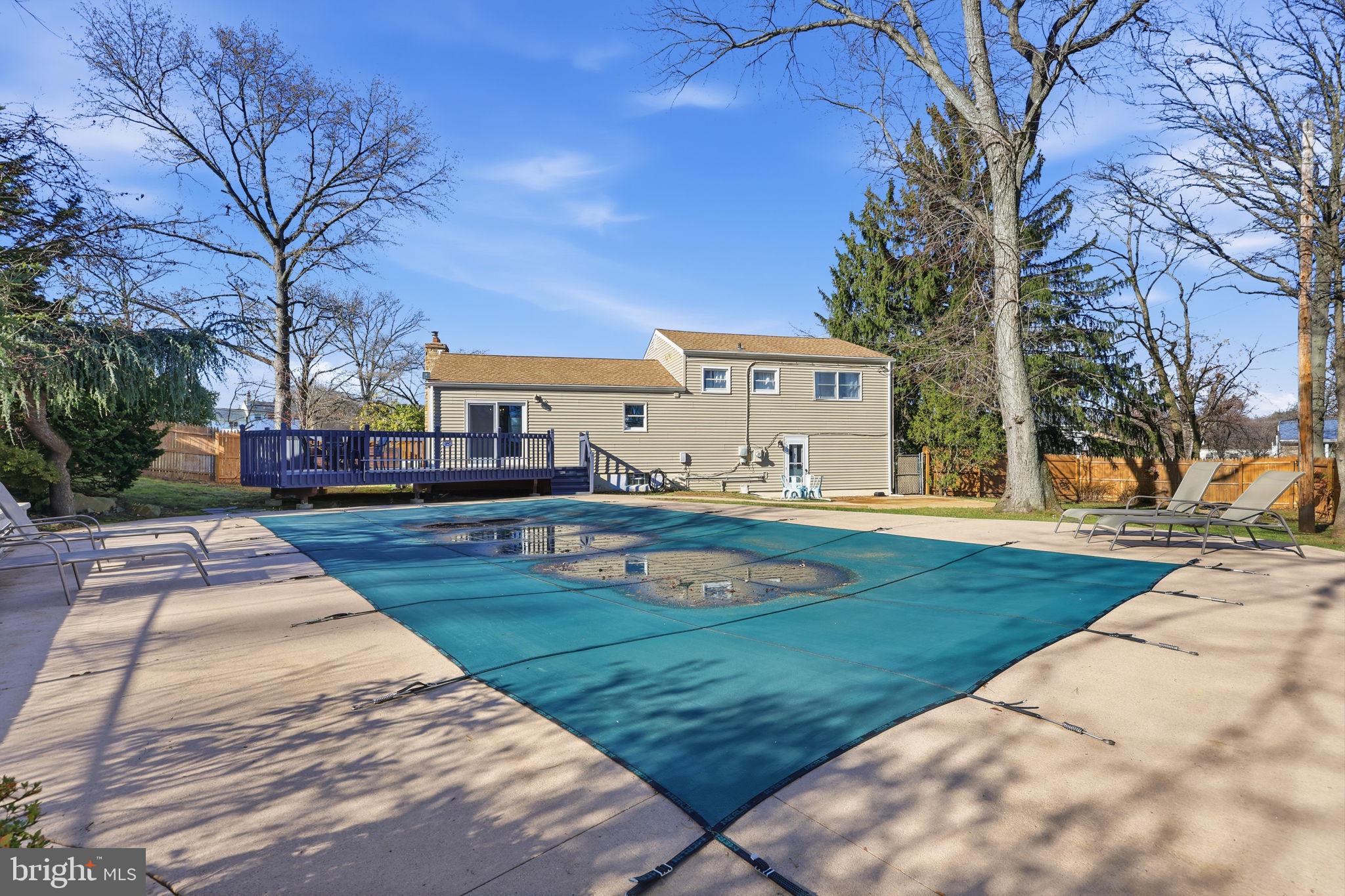 5 Patrick Lane Yardley, PA 19067 - Photo 40 of 51 a view of a house with swimming pool and sitting area