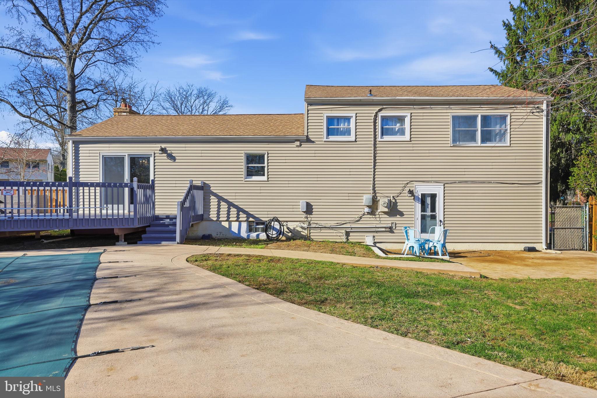 5 Patrick Lane Yardley, PA 19067 - Photo 41 of 51 a view of a house with a yard and deck