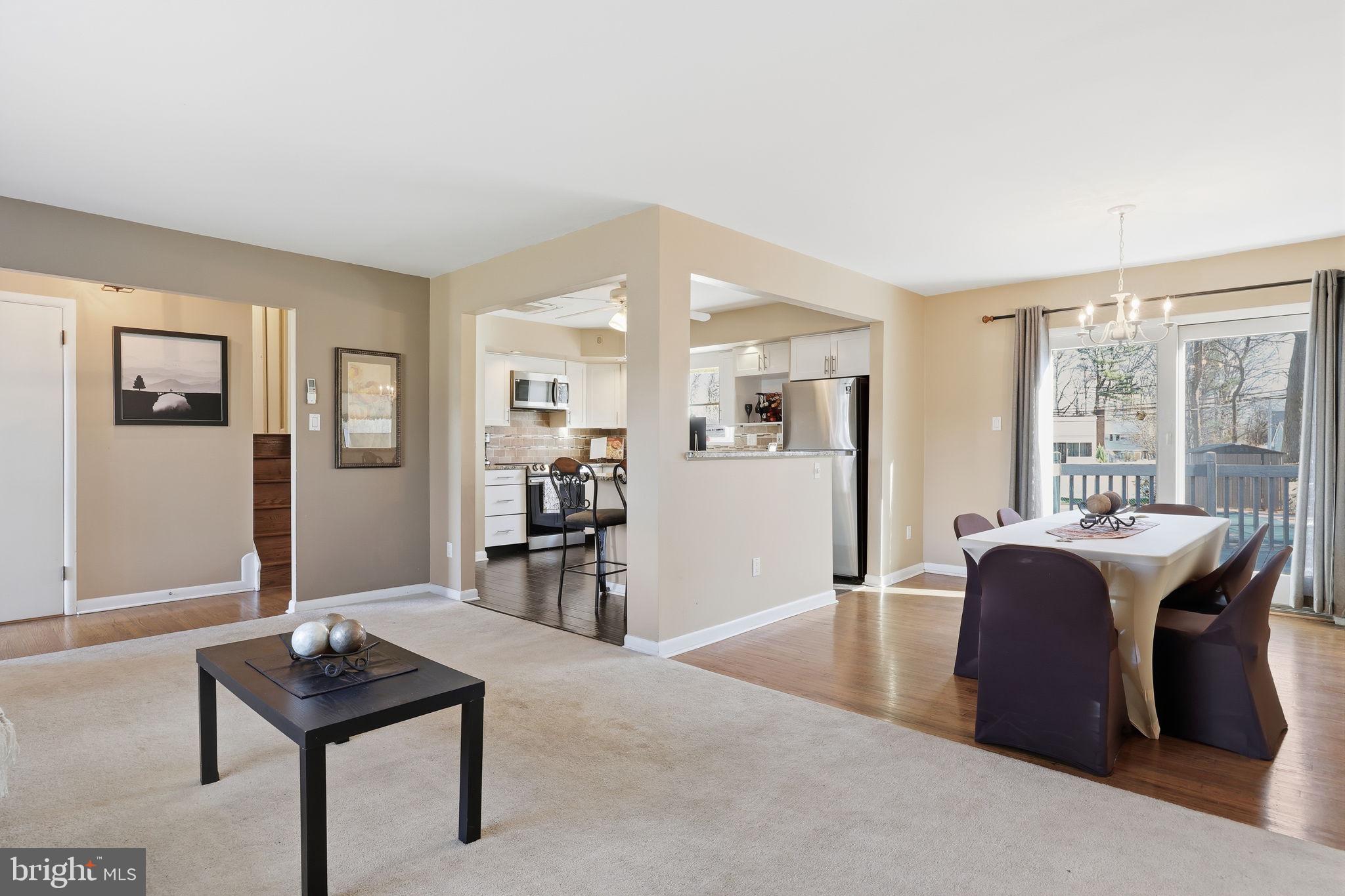 5 Patrick Lane Yardley, PA 19067 - Photo 10 of 51 a living room with furniture a table and a large window