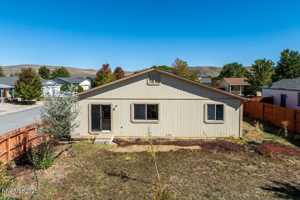 17870 Fairfax Court Reno, NV 89508 - Photo 21 of 23 a house with trees in the background