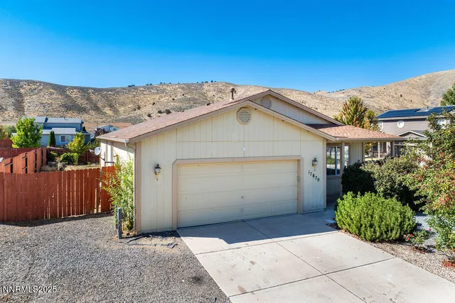 a view of a house with a garage