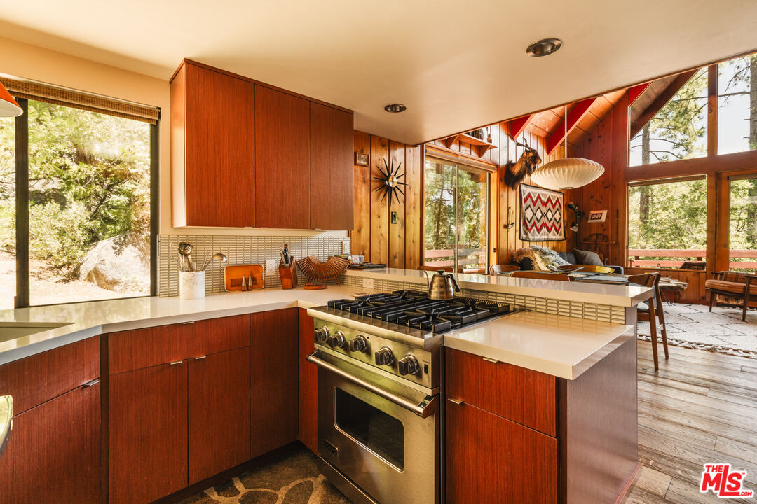 26955 Meadow Glen Drive Idyllwild, CA 92549 - Photo 13 of 57 a kitchen with stainless steel appliances granite countertop a stove and a sink