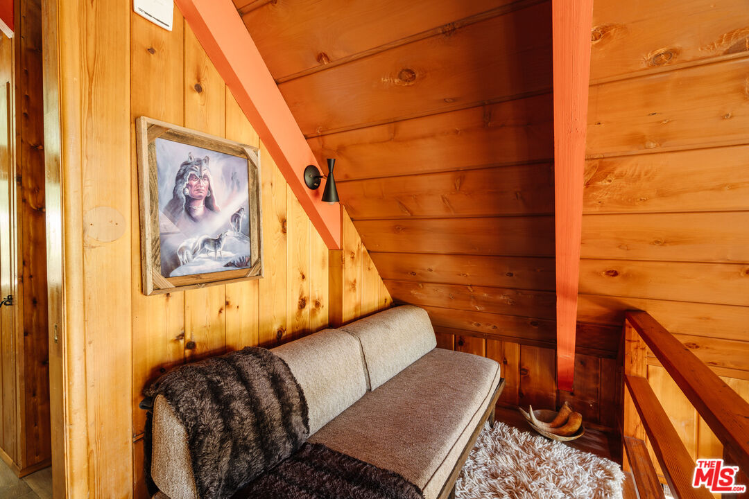 26955 Meadow Glen Drive Idyllwild, CA 92549 - Photo 20 of 57 a bedroom with a bed and wooden floor