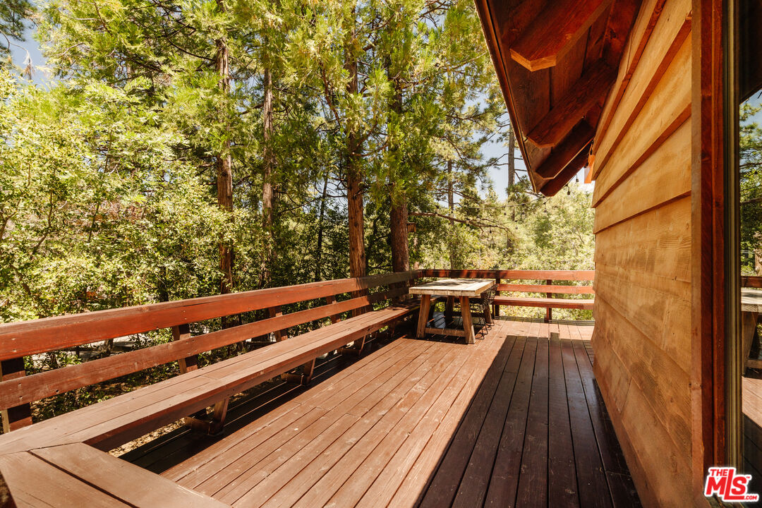 26955 Meadow Glen Drive Idyllwild, CA 92549 - Photo 47 of 57 a view of a two chairs and table in a balcony