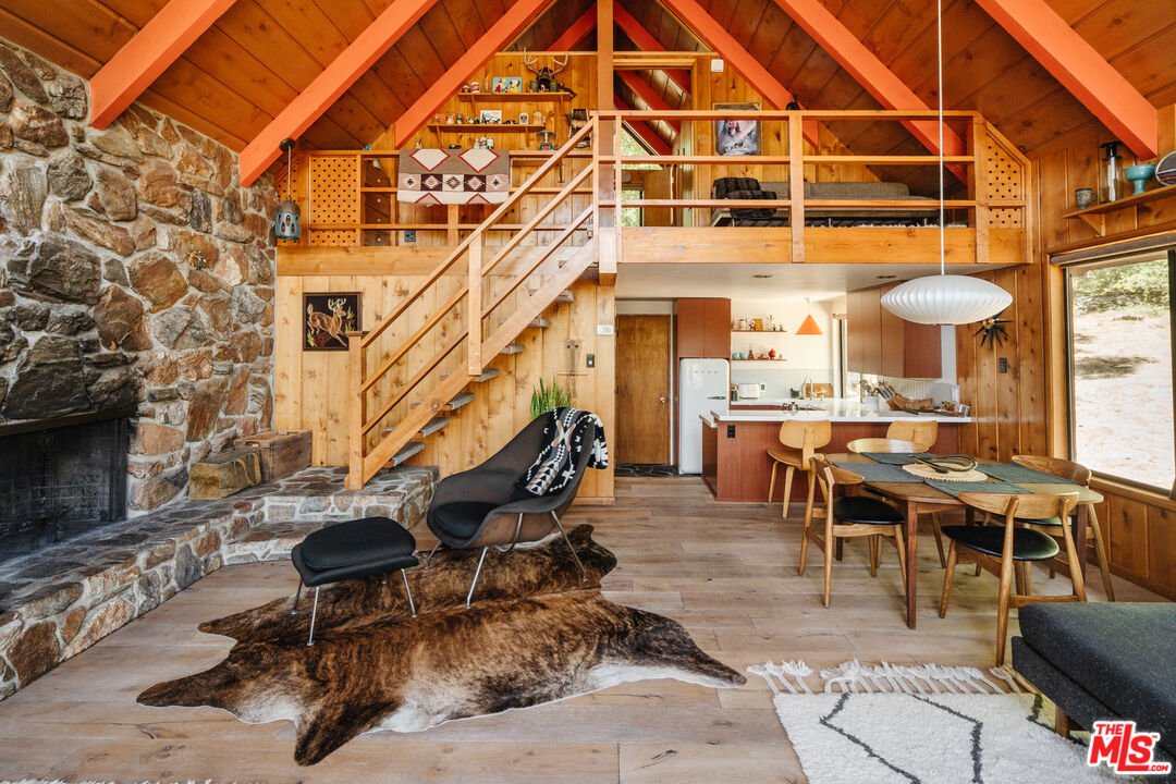 26955 Meadow Glen Drive Idyllwild, CA 92549 - Photo 9 of 57 a view of a chairs and table in a patio