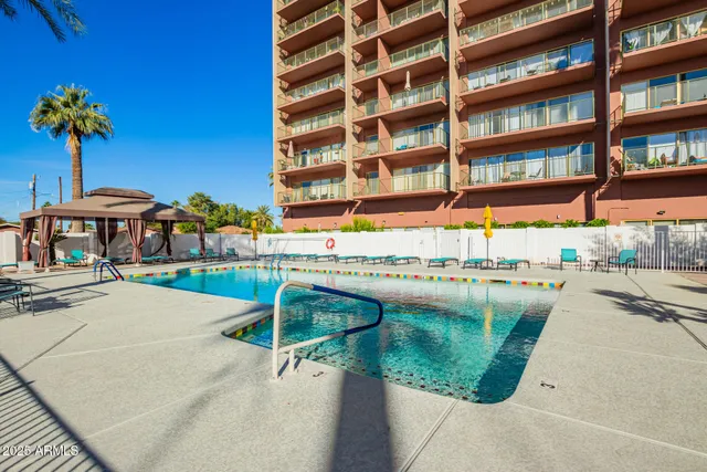 a view of building with outdoor space and seating area