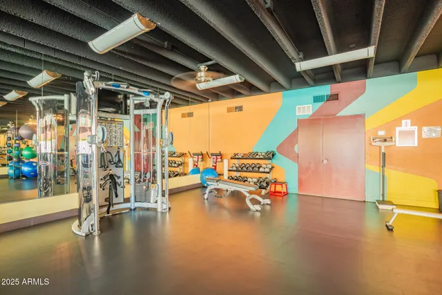 a view of a studio with wooden floor