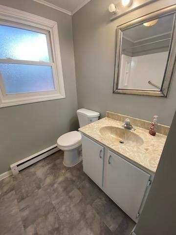 270 Sunderland Road, Unit 37 Worcester, MA 01604 - Photo 15 of 17 a bathroom with a granite countertop sink a toilet and mirror