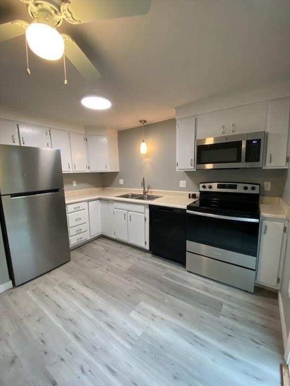 270 Sunderland Road, Unit 37 Worcester, MA 01604 - Photo 3 of 17 a kitchen with stainless steel appliances granite countertop a stove a sink and a refrigerator