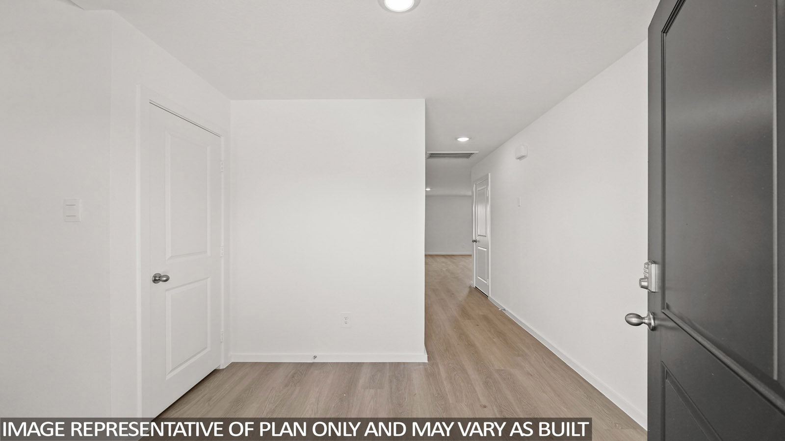 176 Baby Calf Roping Road Jarrell, TX 76537 - Photo 3 of 23 Unfurnished room featuring light wood-style flooring and recessed lighting