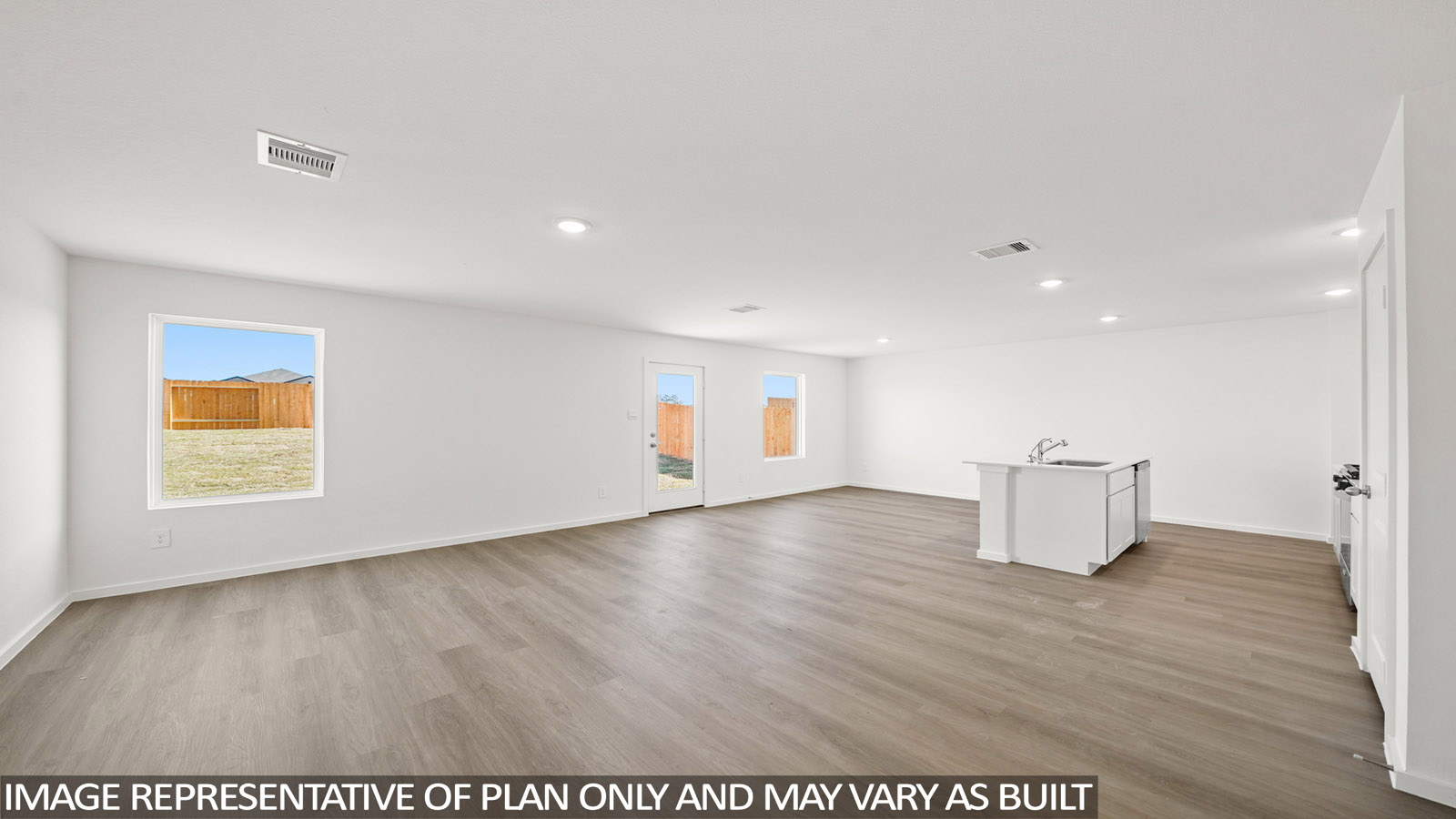 176 Baby Calf Roping Road Jarrell, TX 76537 - Photo 5 of 23 Below grade area with light wood-type flooring, plenty of natural light, and recessed lighting