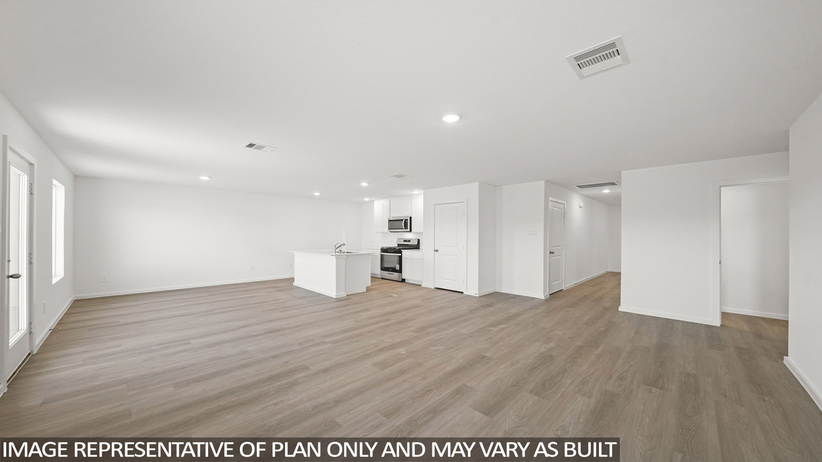 176 Baby Calf Roping Road Jarrell, TX 76537 - Photo 6 of 23 Unfurnished living room featuring light wood-style flooring and recessed lighting