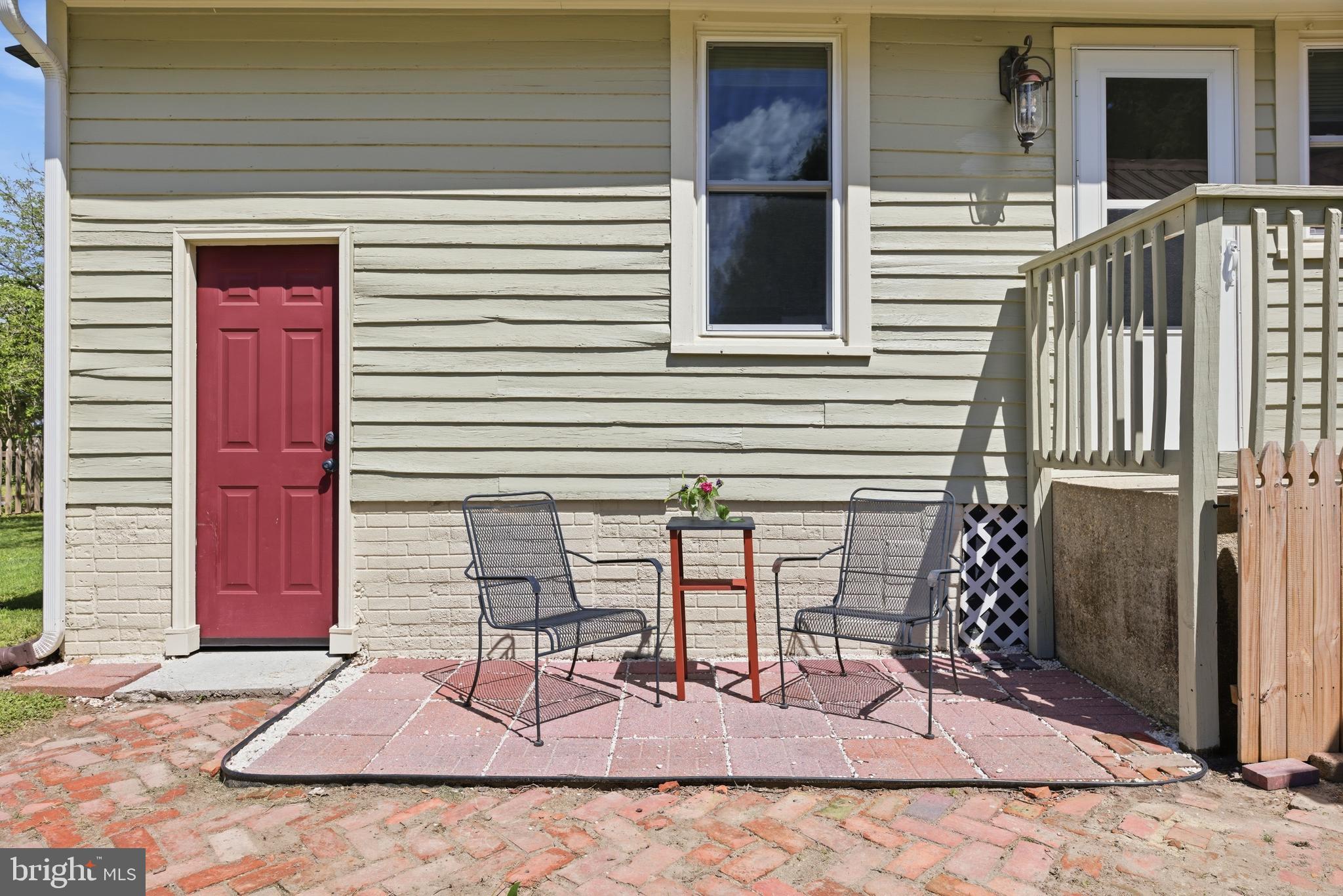 106 Main Street Preston, MD 21655 - Photo 26 of 31 a view of a chairs and table in the patio