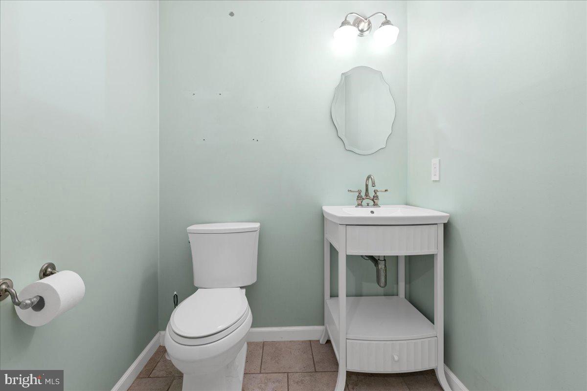 3806 Colony Point Place Edgewater, MD 21037 - Photo 27 of 37 Basement Half Bath
5' 4" X 5'