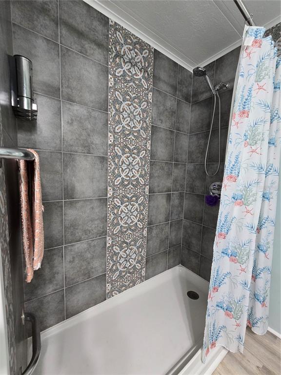 5619 Bayshore Road, Unit 435 Palmetto, FL 34221 - Photo 22 of 56 a bathroom with a bathtub and shower