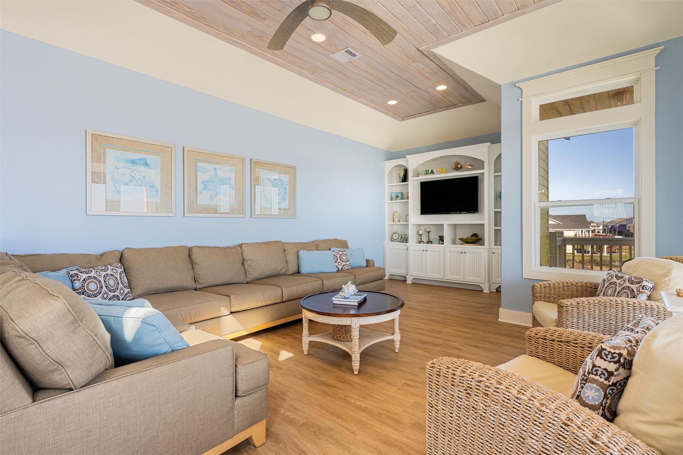 804 Eastview Crystal Beach, TX 77650 - Photo 21 of 50 a living room with furniture and a flat screen tv