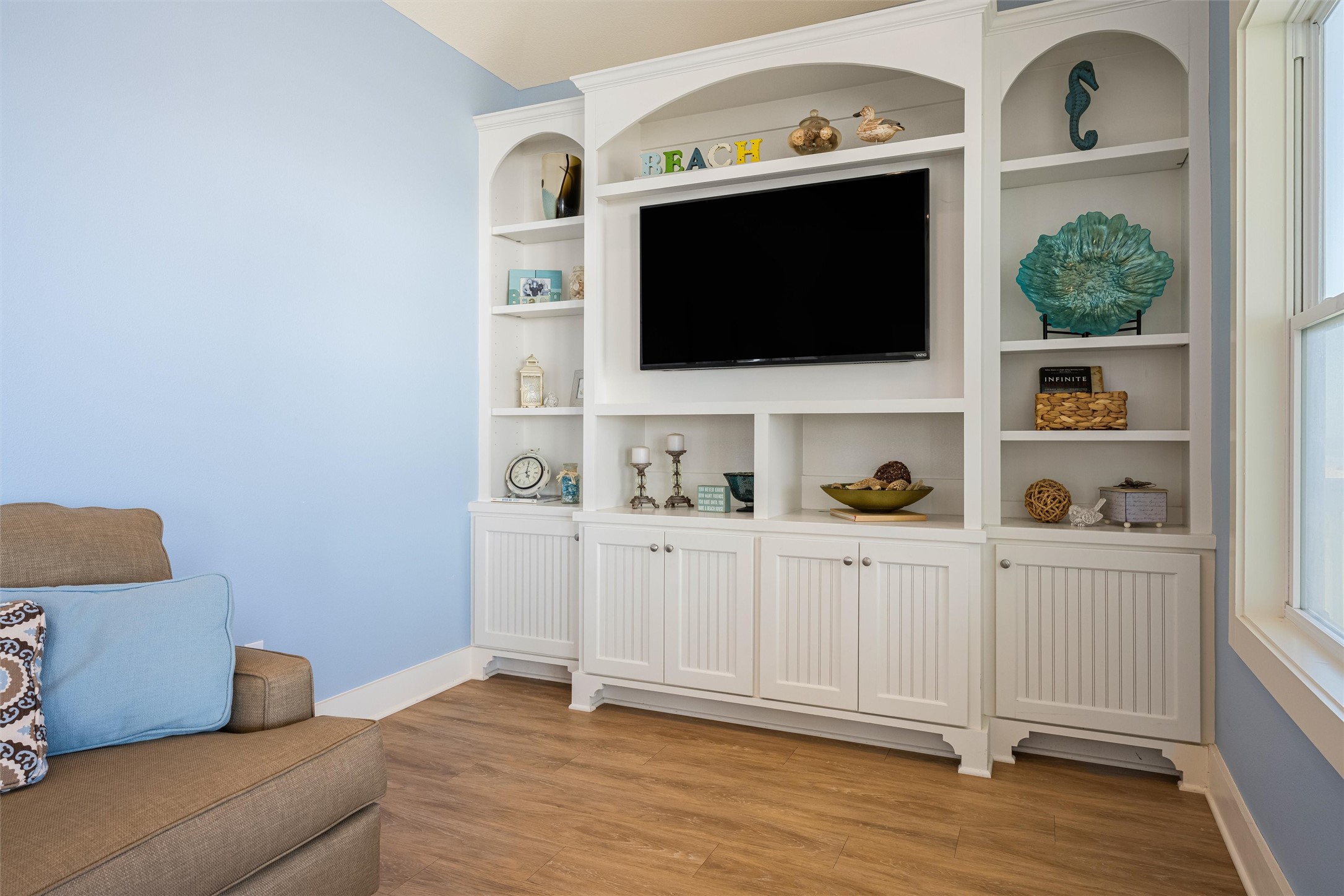 804 Eastview Crystal Beach, TX 77650 - Photo 24 of 50 a living room with flat screen tv and a window