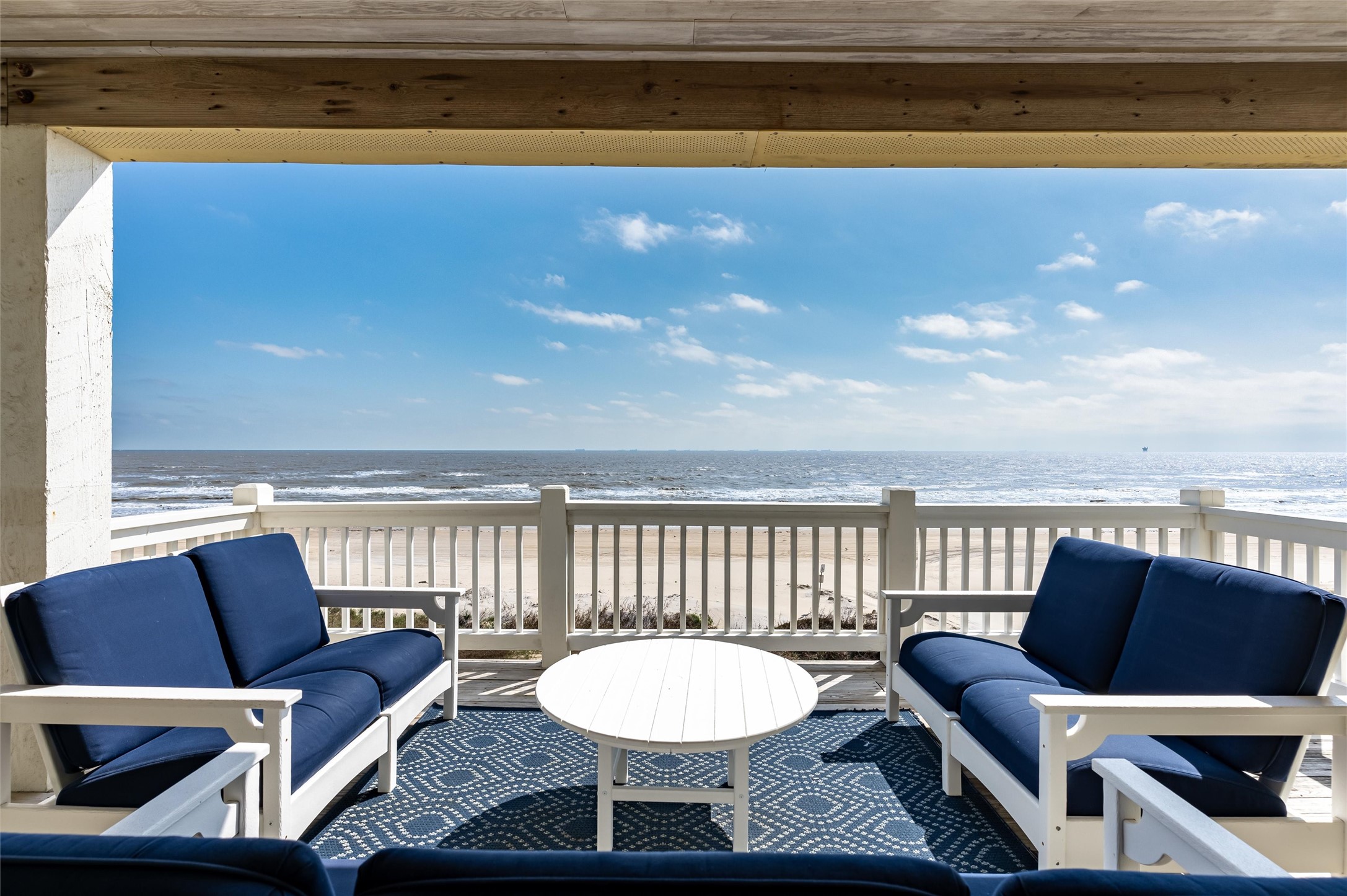 804 Eastview Crystal Beach, TX 77650 - Photo 25 of 50 a view of a chair and table in the terrace