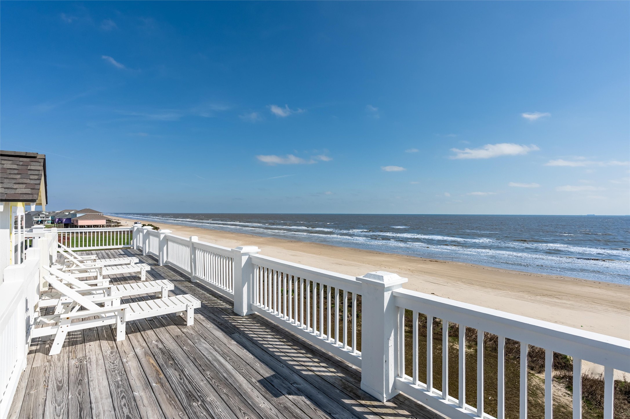 804 Eastview Crystal Beach, TX 77650 - Photo 29 of 50 a view of balcony with wooden floor