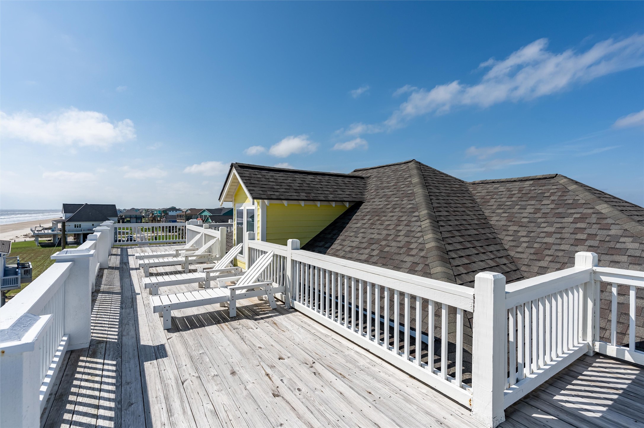 804 Eastview Crystal Beach, TX 77650 - Photo 30 of 50 a view of a balcony with wooden floor