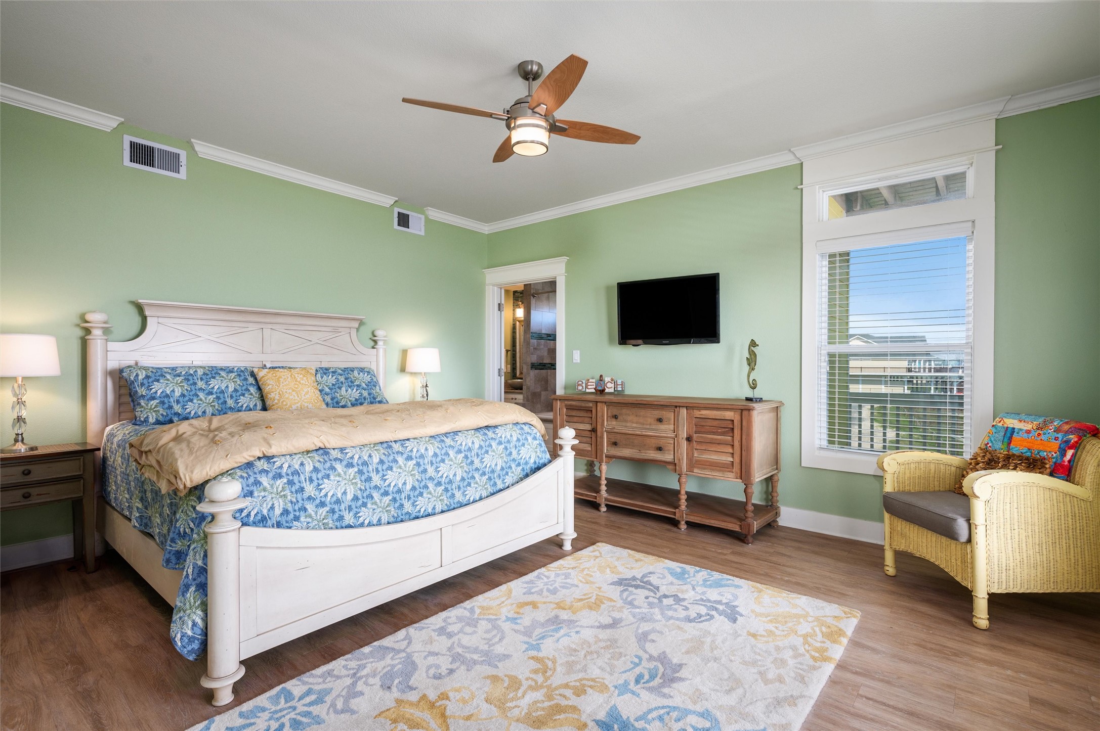 804 Eastview Crystal Beach, TX 77650 - Photo 33 of 50 a bedroom with bed and flat screen tv