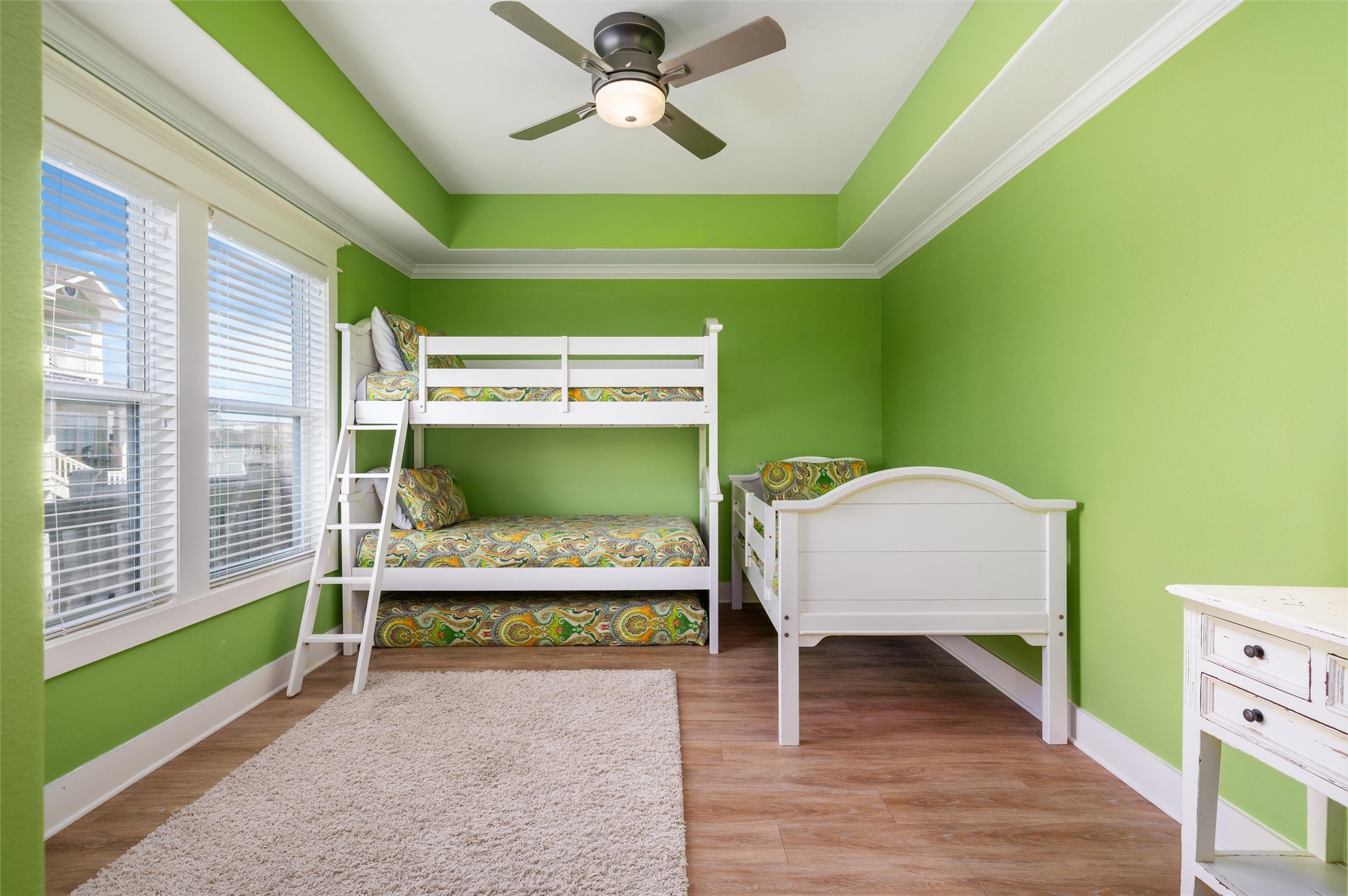 804 Eastview Crystal Beach, TX 77650 - Photo 41 of 50 a bedroom with a bed and a window