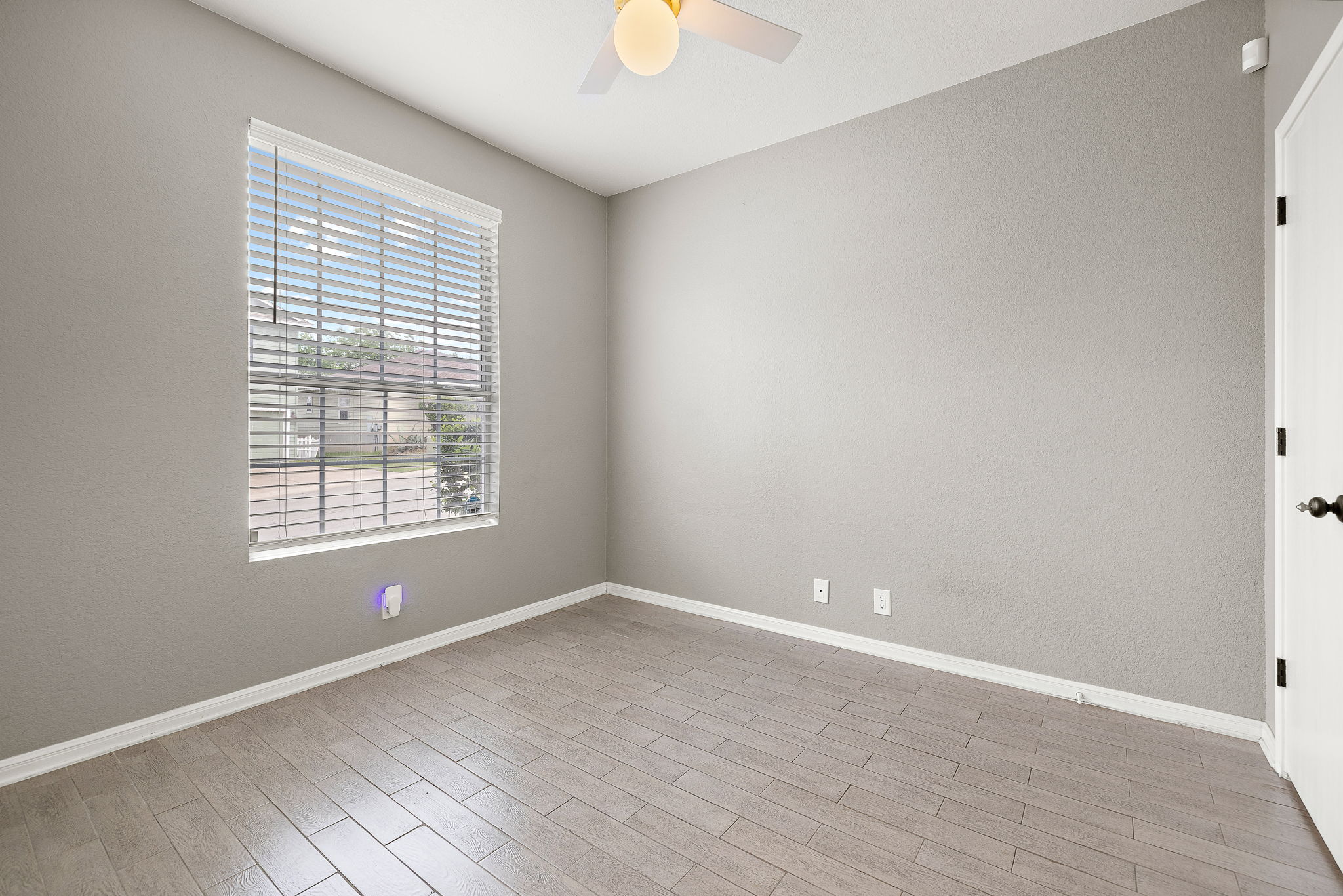 9208 Magna Carta Loop Austin, TX 78754 - Photo 17 of 26 Downstairs bedroom would also make a great office