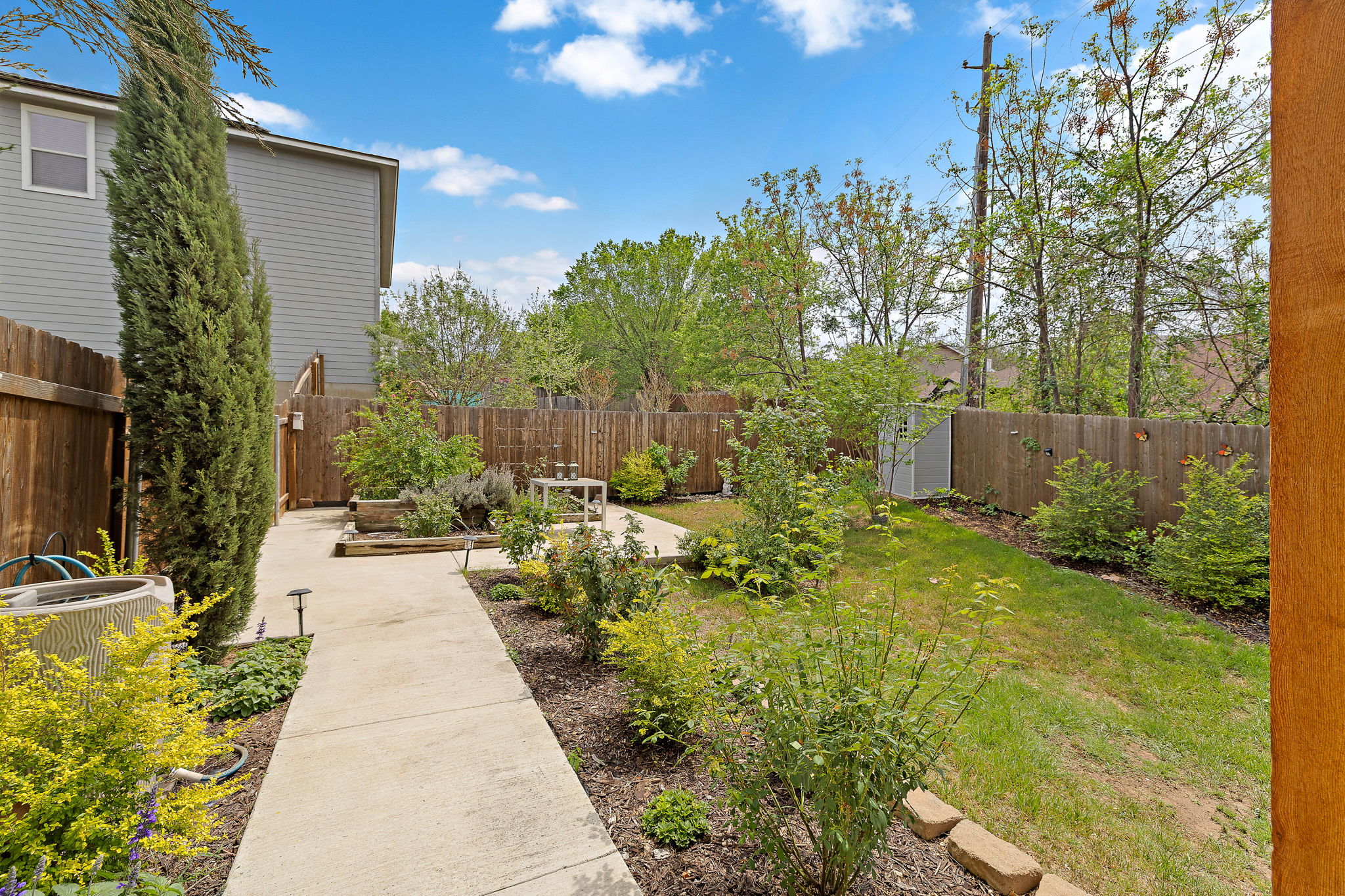 9208 Magna Carta Loop Austin, TX 78754 - Photo 24 of 26 Outside, you'll be surrounded by relaxing greenery!