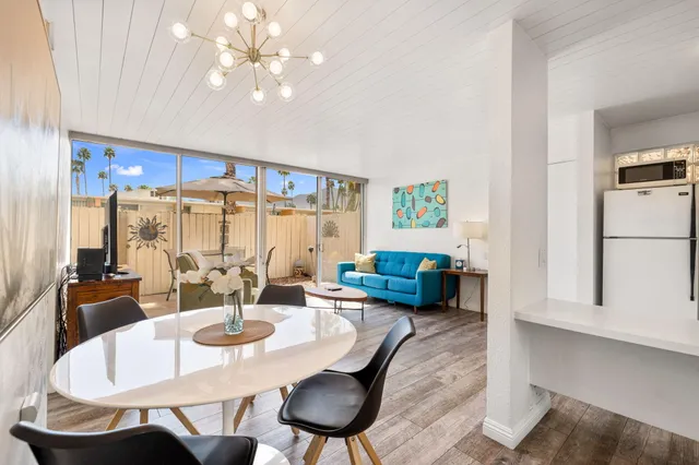 a view of a dining room with furniture