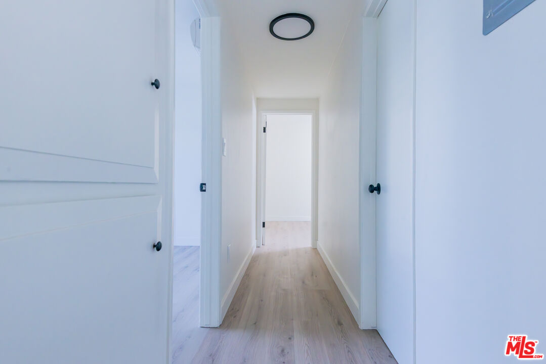 1303 Beryl Street, Unit B Redondo Beach, CA 90277 - Photo 15 of 22 a view of a room with wooden floor