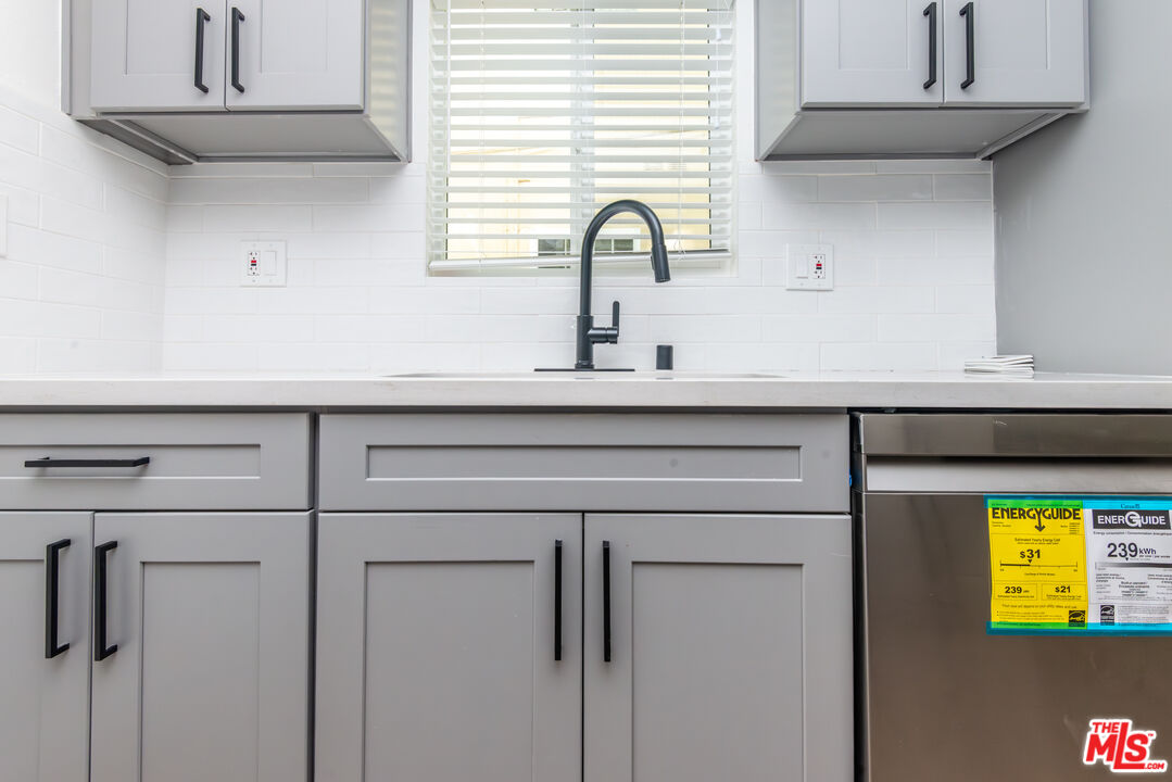 1303 Beryl Street, Unit B Redondo Beach, CA 90277 - Photo 10 of 22 a sink with white cabinets