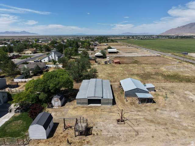 3732 Campbell Road Tooele, UT 84074 - Photo 49 of 69 Expansive property featuring multiple outbuildings, including two large metal-roofed structures