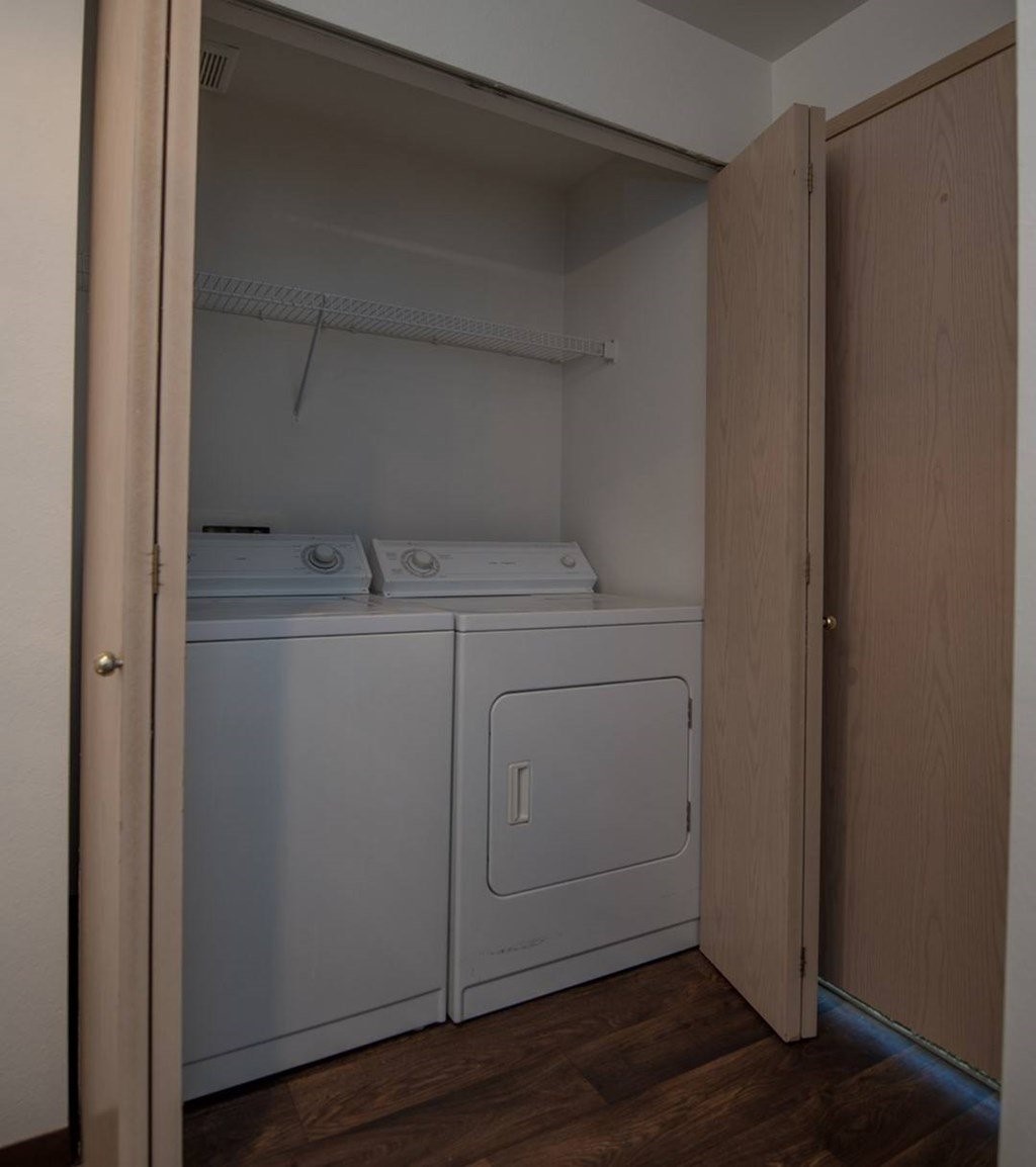 1001 Northeast Briarcreek Way Hillsboro, OR 97006 - Photo 1 of 19 a utility room with cabinets washer and dryer