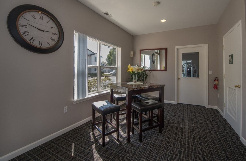 1001 Northeast Briarcreek Way Hillsboro, OR 97006 - Photo 11 of 19 a view of a room with a table and a large window