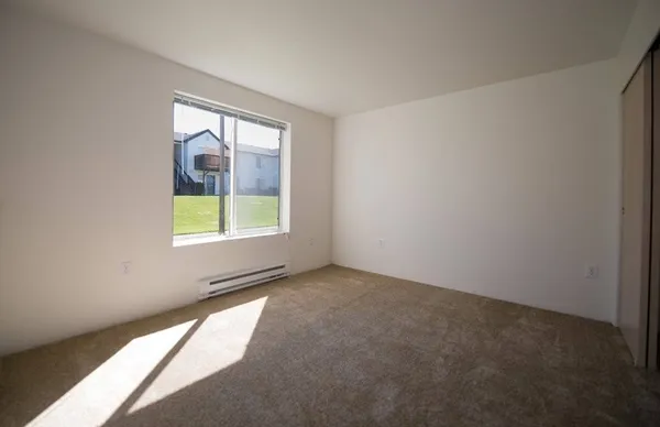 an empty room with windows