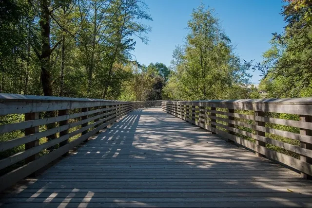 a view of a room with a table and a large window