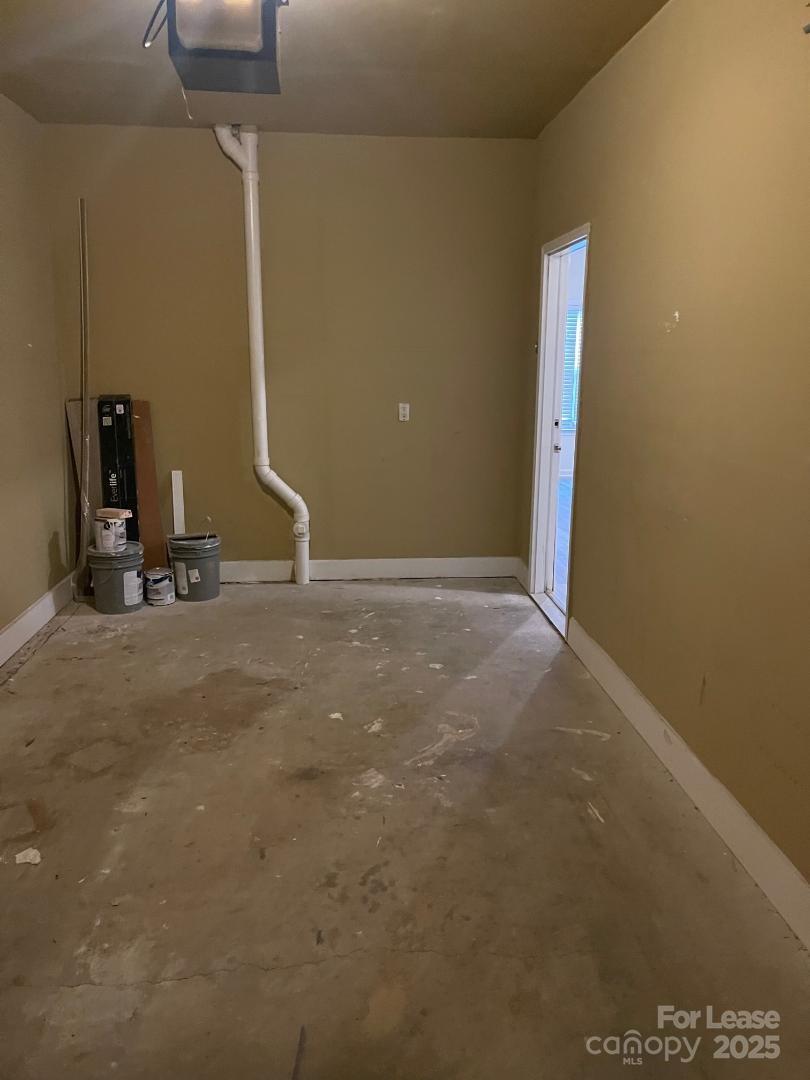 2121 Lennox Square Road Charlotte, NC 28210 - Photo 10 of 17 a view of a room with gym equipment