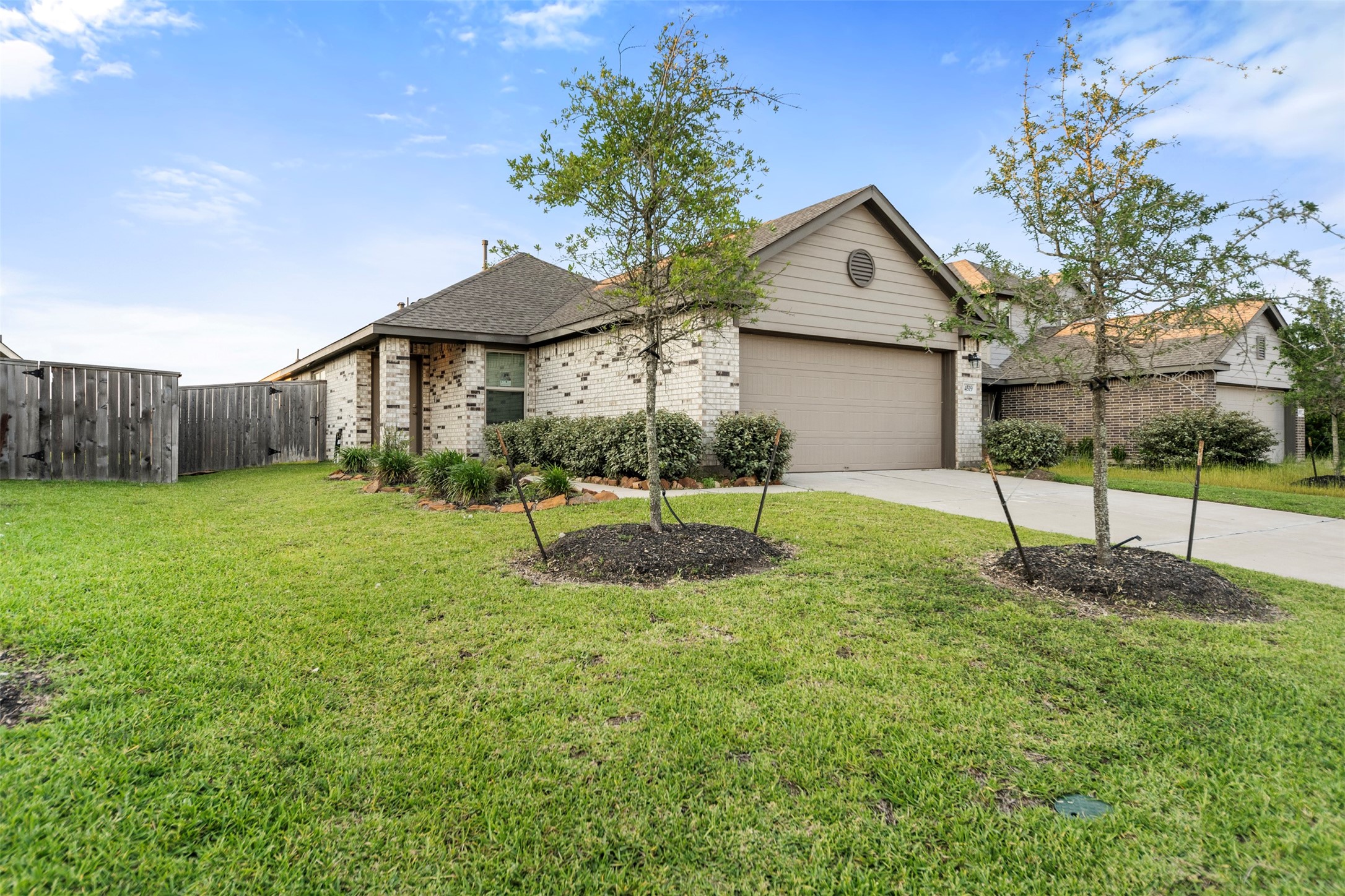 14519 Broadbury Pond Road Rosharon, TX 77583 - Photo 1 of 22 a view of a house with a yard and sitting area