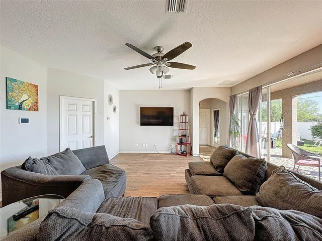 a kitchen with a sink stainless steel appliances and cabinets